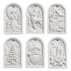 Six white paintable Christmas ornaments with angel, reindeer, winter cottage, Christmas tree, Santa and candle designs